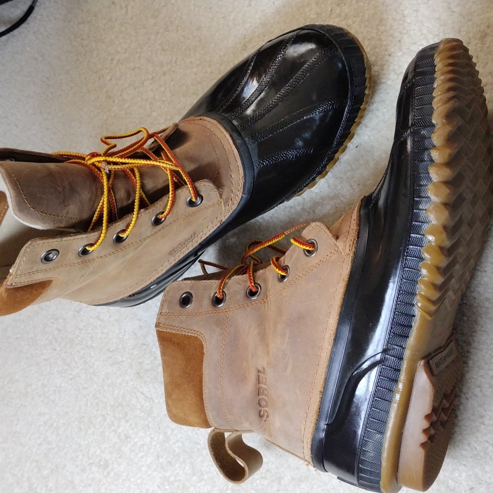 Sorel men's black rubber & tan leather winter boots. Size 11.5